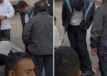 Trabajadora de la Corte limpia zapato del ministro presidente de México y se desata la polémica (VIDEO)